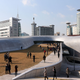 A group of reporters are seen visiting the exterior of the Dongdaemun Design Plaza during a press preview in Seoul, South Korea